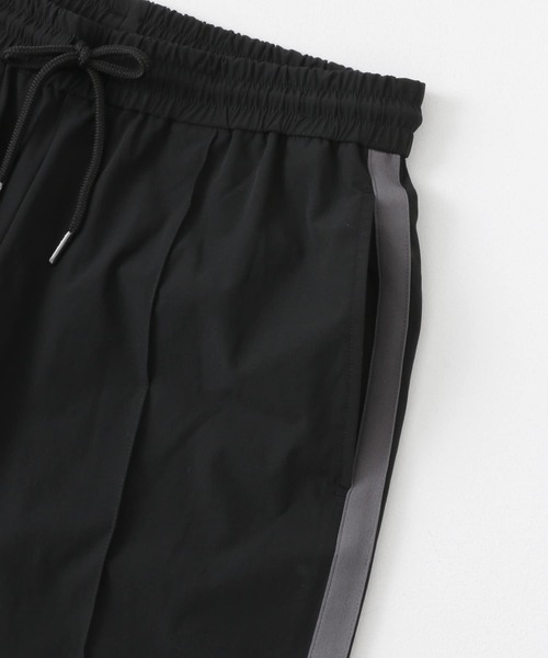 Uiscel(ユイセル)の「Uiscel 4wayストレッチサイドラインパンツ(その他パンツ・メンズ・ブラック/ブルー・MEDIUM/LARGE)」の22枚目の写真