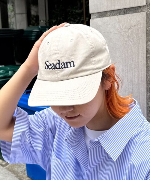 SEADAM(シーダム)の「【SEADAM】〈UNISEX〉newhattanロゴ刺繍キャップ(キャップ・メンズ・アイボリー/ブラック/ライトベージュ/グリーン・ONE SIZE)」の1枚目の写真