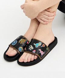 COACH（コーチ）の「ユーデル スライド・レキシー プリント（サンダル）」