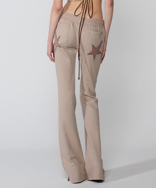 【SCULPTOR】グリッターブーツカットスウェットパンツベージュ SCULPTOR（スカルプター）の「Glitter Boots Cut Sweatpants