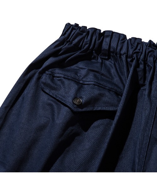 UNFRM OUTDOOR STANDARD（ユニフォームアウトドアスタンダード）の「UNFRM OUTDOOR STANDARD STRETCH CHINO CLOTH TWO TUCK WIDE HALF PANTS（ユニフォームアウトドアスタンダード  ストレッチ チノクロス ツータック ワイドハーフパンツ）（その他パンツ・メンズ・ネイビー/ベージュ・X-LARGE/LARGE/MEDIUM/SMALL）」の12枚目の写真