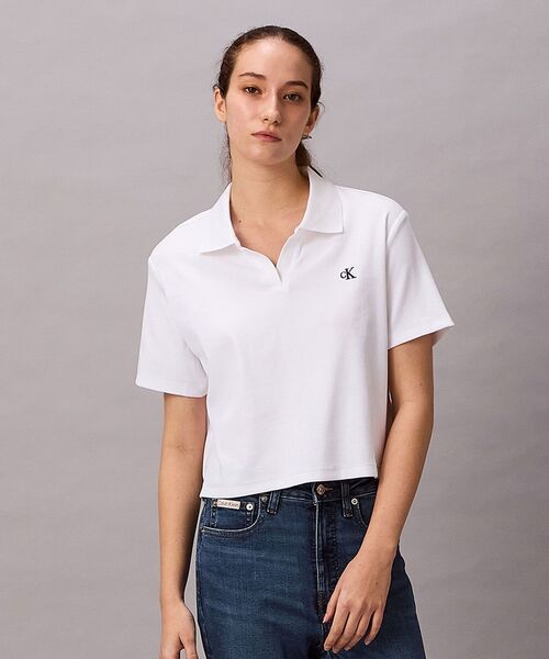 Calvin Klein(カルバン・クライン)の「CKモノグラムリブショートスリーブポロシャツ(ポロシャツ・レディース・ブラック/ホワイト・S/M/XS)」の1枚目の写真