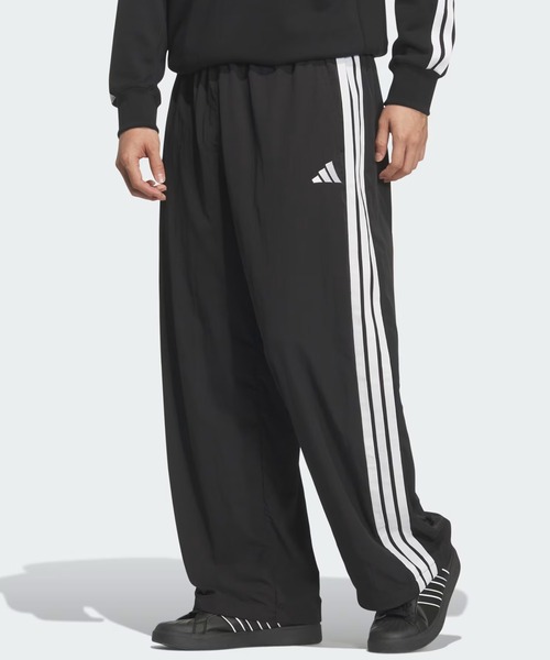 adidas(アディダス)の「adidas/アディダス ジャージ トラックパンツ 軽パン ウーブントラックパンツ SU952(その他パンツ・メンズ・ブラック×ホワイト・2XL/XL/L/M)」の1枚目の写真