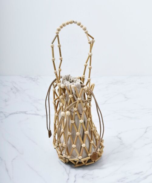 le.coeur blanc（ルクールブラン）の「BAGMATI ウッドビーズバッグ（かごバッグ・レディース・オフホワイト・FREE）」の6枚目の写真