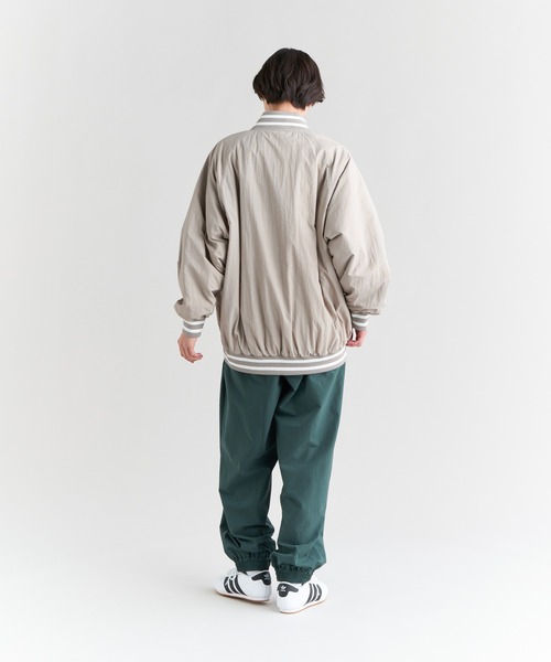 NANGA(ナンガ)の「SOFT DOWN STADIUM JKT W/ソフトダウン スタジアム ジャケット(ウィメンズ)(スタジャン・レディース・ブラック/ベージュ/グリーン/イエロー/オレンジ・M/S/L)」の19枚目の写真