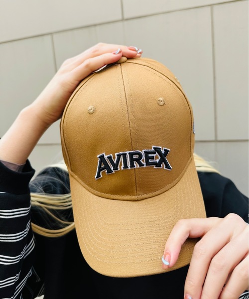 AVIREX(アヴィレックス)の「AVIREX / AX EX VARSITY 3DLOGO CAP / 80974500(キャップ・レディース・ベージュ/ブルー/グレー/ブラック・FREE)」の1枚目の写真