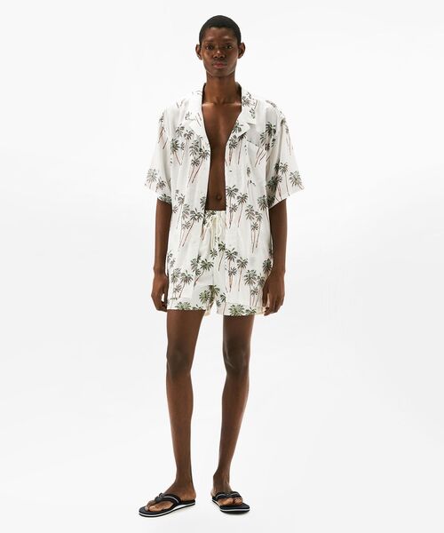 TOMMY HILFIGER（トミーヒルフィガー）の「ミディアムドローストリングプリントボードショーツ（水着・メンズ・ホワイト/グリーン/ホワイト系その他/マルチ/オレンジ・MEDIUM/LARGE/X-LARGE）」の6枚目の写真