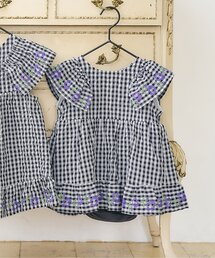 Seraph（セラフ）の「【リンク】クロス刺繍ロンパース（ロンパース）」