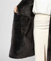 UNKNOWN.（アンノウン）の「UNKNOWN ロング丈フードムートンコート