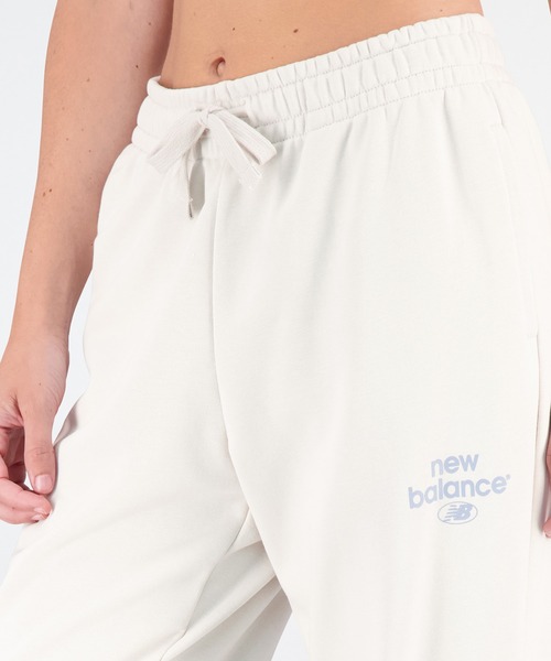 NEW BALANCE（ニューバランス）の「NB Essentials グラフィックスウェットパンツ（スウェットパンツ・レディース・アイボリー/ブラック・LARGE/MEDIUM/SMALL/X-LARGE）」の6枚目の写真