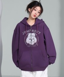 A‘gem 9（エージェムナイン）の「A'GEM/9 × .kom『JUMPNEXT／ジャンプネクスト』ドッグフーディージップアップパーカー（パーカー）」