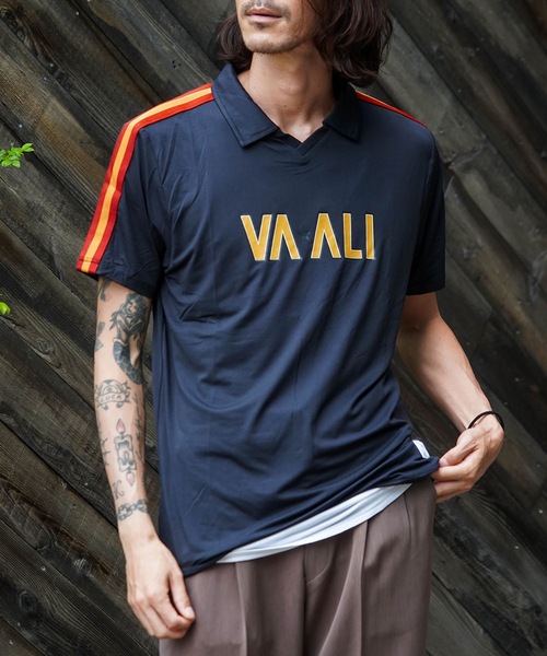 RVCA(ルーカ)の「RVCA メンズ VA X ALI RUMBLE POLO SS ポロシャツ 【2025年秋冬モデル】/ルーカモハメド・アリコラボポロシャツ(ポロシャツ・メンズ・ブラック・SMALL/MEDIUM/LARGE/X-LARGE)」の1枚目の写真