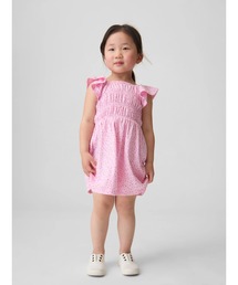 GAP（ギャップ）の「スモッキングギャザー フラッターフリルスリーブ ワンピース (幼児・ベビー)（ワンピース）」