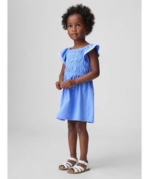 GAP（ギャップ）の「スモッキングギャザー フラッターフリルスリーブ ワンピース (幼児・ベビー)（ワンピース）」