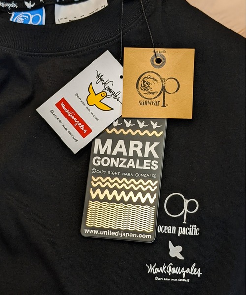 Mark Gonzales(マーク・ゴンザレス)の「MARK GONZALES×OCEAN PACIFIC/マークゴンザレス×オーシャンパシフィック "SURF"イラストプリントTEE(Tシャツ/カットソー・メンズ・ホワイト/ブラック/ベージュ/ミント・MEDIUM/LARGE/X-LARGE)」の15枚目の写真