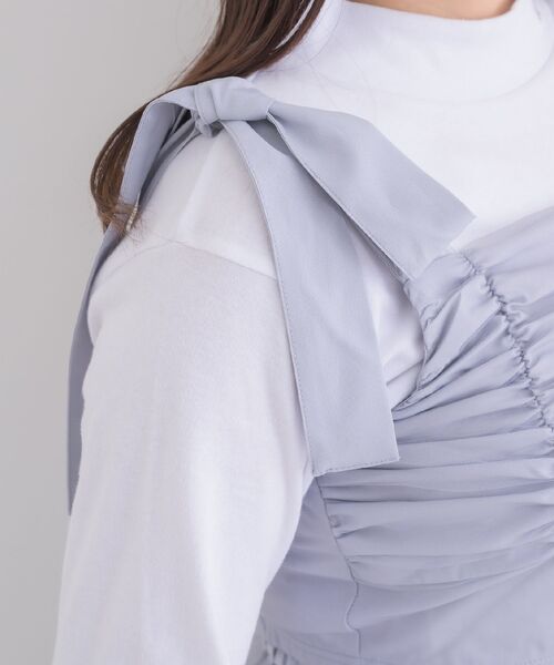ems excite(エムズエキサイト)の「肩リボンビスチェ(シャツ/ブラウス・レディース・ナチュラル/ブルー/ブラック・FREE)」の21枚目の写真