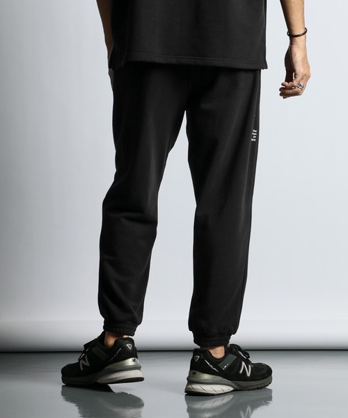 The DUFFER of ST.GEORGE(ザダファーオブセントジョージ)の「【WEB限定アイテム】9.5oz T/C SWEAT LOOSE FIT EASY PT:セットアップ 9.5オンススウェット ルーズフィット ウェービングベルト イージーパンツ(スウェットパンツ・メンズ・チャコールグレー/ブラック/ホワイト・X-LARGE/LARGE/MEDIUM/SMALL)」の14枚目の写真