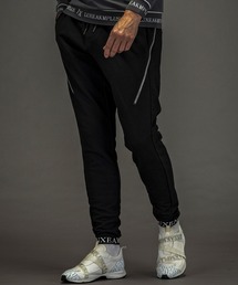 LUXEAKMPLUS（リュクスエイケイエムプラス）の「LUXEAKMPLUS(リュクスエイケイエムプラス)ゴルフ ブランドロゴ テーパードシルエット トレーニング ロングパンツ(ストレッチ性/吸水速乾)（スウェットパンツ）」