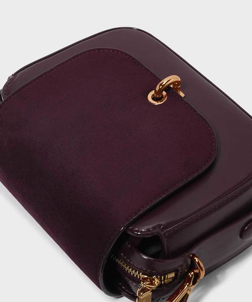 CHARLES & KEITH（チャールズ & キース）の「グロメットディテールストラップバッグ / GROMMET DETAIL STRAP BAG（ショルダーバッグ・レディース・ダークグリーン/ピンク系その他/プラム・S）」の10枚目の写真