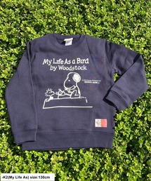 SNOOPY×OLD BETTY'S（スヌーピーカケルオールドベティーズ）の「スヌーピー【SNOOPY】Kids Crew Neck Sweat(My Life As柄)（スウェット）」
