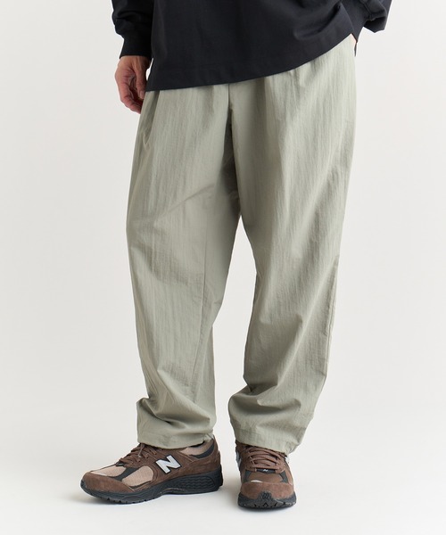 NANGA（ナンガ）の「NYLON TUSSER TRACK PANTS/ナイロンタッサー トラックパンツ（その他パンツ・メンズ・ブラック/カーキ/ネイビー・L/M/S/XL）」の2枚目の写真