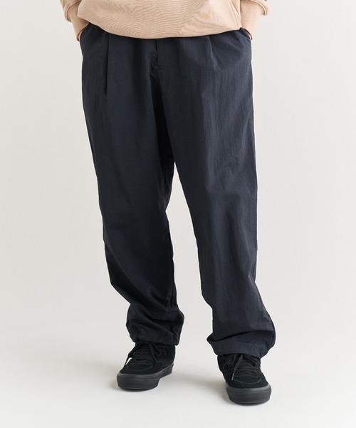 NANGA（ナンガ）の「NYLON TUSSER TRACK PANTS/ナイロンタッサー トラックパンツ（その他パンツ・メンズ・ブラック/カーキ/ネイビー・L/M/S/XL）」の6枚目の写真