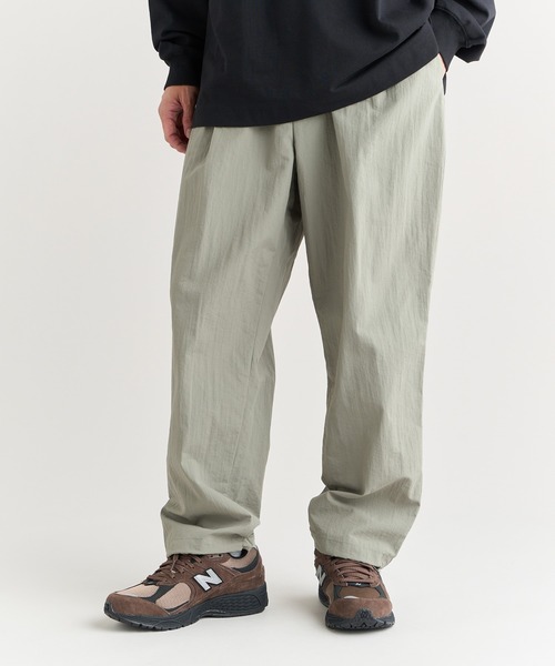 NANGA（ナンガ）の「NYLON TUSSER TRACK PANTS/ナイロンタッサー トラックパンツ（その他パンツ・メンズ・ブラック/カーキ/ネイビー・L/M/S/XL）」の13枚目の写真