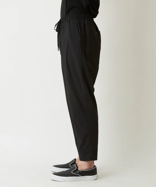 WHITE MOUNTAINEERING（ホワイトマウンテニアリング）の「【White Mountaineering/ホワイトマウンテニアリング】TAPERED PANTS（スラックス・メンズ・ネイビー/ブラック・1/2）」の5枚目の写真