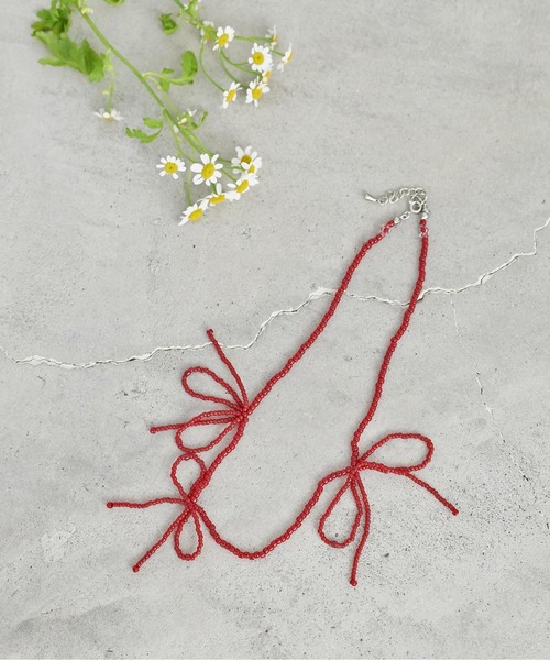 chambre de charme（シャンブルドゥシャーム）の「cdc ビーズ リボンむすび ネックレス（ネックレス・レディース・レッド/クリア・FREE）」の2枚目の写真