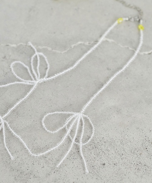 chambre de charme（シャンブルドゥシャーム）の「cdc ビーズ リボンむすび ネックレス（ネックレス・レディース・レッド/クリア・FREE）」の5枚目の写真