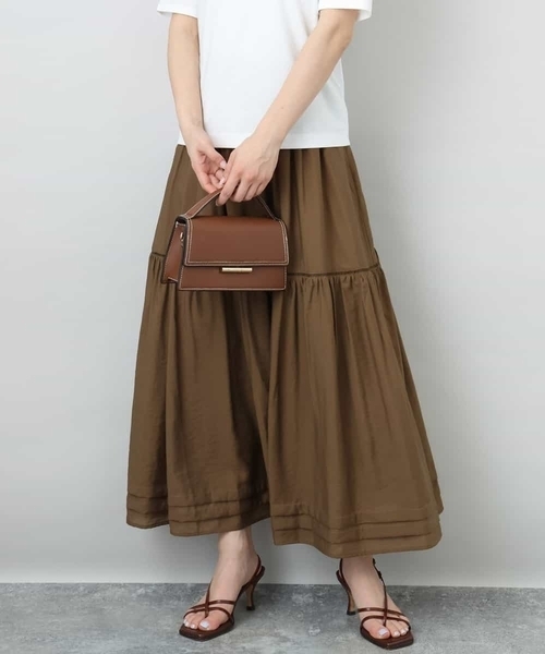 MK MICHEL KLEIN(エムケーミッシェルクラン)の「ハシゴレース使いフレアースカート/洗える(スカート・レディース・ホワイト/ライトブルー/ブラウン・38)」の2枚目の写真