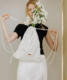 ANDNEEDS（アンドニーズ）の「Bloom gym sack (white)（バックパック/リュック）」