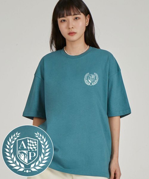 ASTRAL PROJECTION(アストラルプロジェクション)の「エイピシールドエンブレムラウンドネック15番手コットン半袖Tシャツ_ブルーグリーン(Tシャツ/カットソー・レディース・その他・LARGE/X-LARGE)」の1枚目の写真