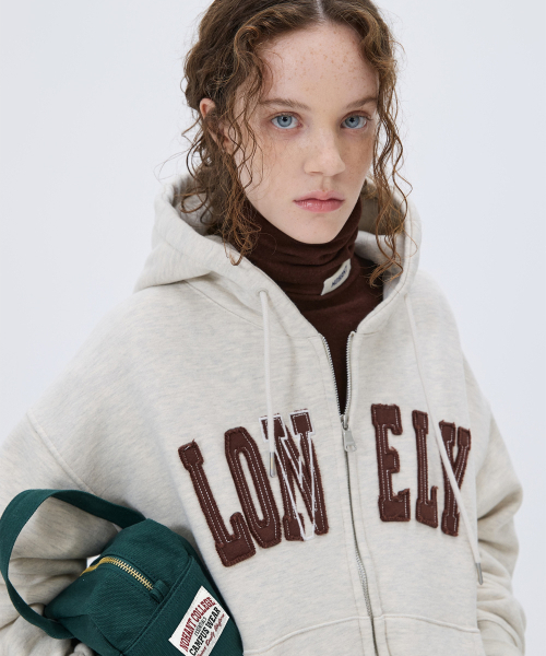 NOHANT（ノアン）の「LONELY/LOVELY CROP HOODIE ZIP-UP OATMEAL（パーカー・レディース・オートミール・SMALL/MEDIUM）」の3枚目の写真