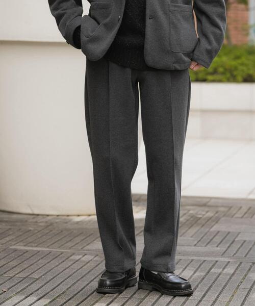 ITEMS URBANRESEARCH(アイテムズ アーバンリサーチ)の「『洗濯可』360° stretch スラックス(その他パンツ・メンズ・ブラック/グレー・MEDIUM/LARGE)」の1枚目の写真