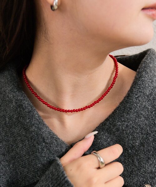 mystic(ミスティック)の「カラービーズネックレス(リング・レディース・アイボリー/レッド・ONE SIZE)」の1枚目の写真