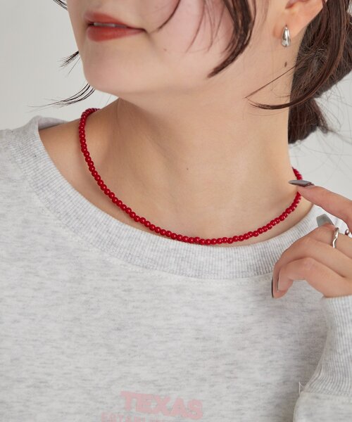 mystic(ミスティック)の「カラービーズネックレス(リング・レディース・アイボリー/レッド・ONE SIZE)」の11枚目の写真