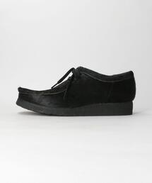 Clarks Originals（クラークスオリジナルズ）の「＜CLARKS＞ ワラビー ブラック ヘアー オン（モカシン/デッキシューズ・メンズ）」
