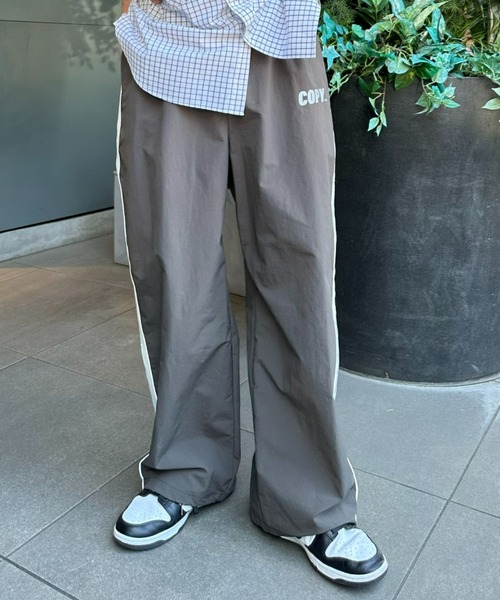 SOUNDSGOOOOD(サウンズグッド)の「【SOUNDS GOOOOD / サウンズグッド】リフレクタープリントナイロントラックパンツ(その他パンツ・メンズ・チャコールグレー/ネイビー・ONE SIZE)」の3枚目の写真