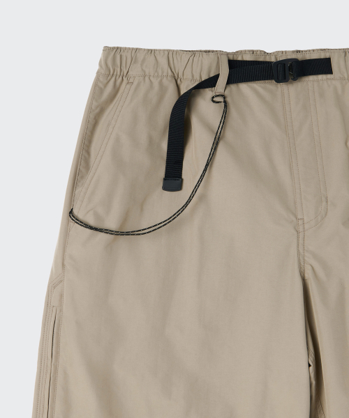 MUSINSA STANDARD（ムシンサスタンダード）の「[シティレジャー] NPサイドジッパーパラシュートパンツ [リーフベージュ]（スウェットパンツ・メンズ・その他・26/27/28/29/30/31/32/33/34/36/38/40/42）」の6枚目の写真