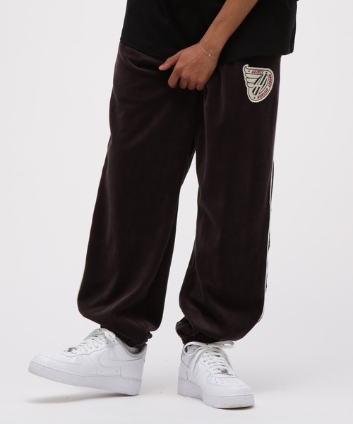 AVIREX（アヴィレックス）の「VELOUR PANTS "A.C.D" / ベロア パンツ / AVIREX / アヴィレックス（その他パンツ・メンズ・グリーン/ブラック・MEDIUM/LARGE/X-LARGE/XX-LARGE）」の2枚目の写真