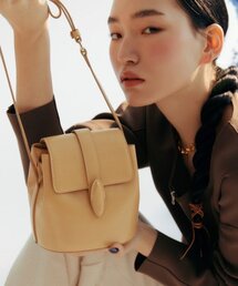 BBYB（ビービーワイビー）の「エコルミニクロスバケットバッグ（マスタード）（ショルダーバッグ）」