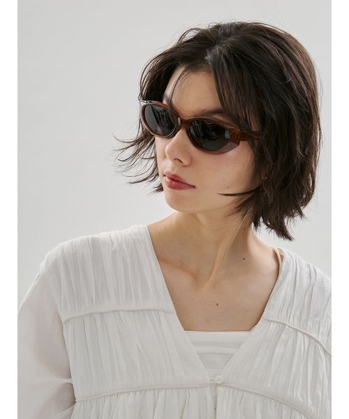 emmi（エミ）の「オーバルキャットアイフレームサングラス（サングラス・レディース・クリア/ブラウン/アイボリー・F）」の4枚目の写真