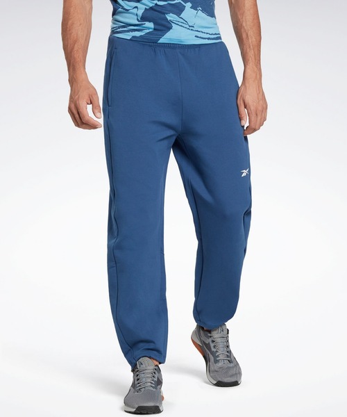 Reebok(リーボック)の「DreamBlend コットン トラックパンツ / DreamBlend Cotton Track Pants(スウェットパンツ・メンズ・ブラック/ブルー・SMALL/MEDIUM/LARGE/X-LARGE/XX-LARGE/X-SMALL/XXX-LARGE)」の2枚目の写真