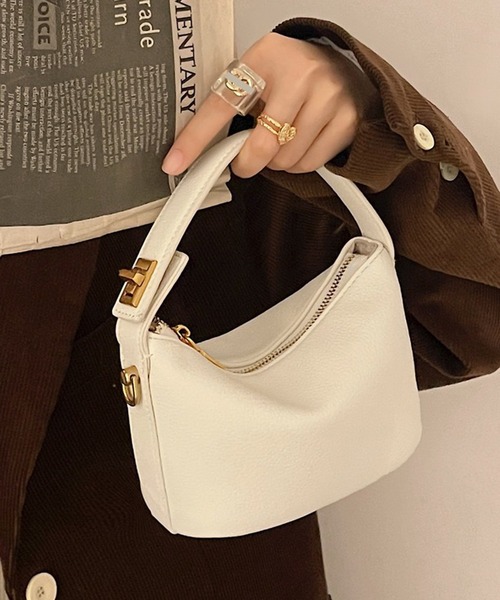 folka(フォルカ)の「7B44 2WAY リラインミニショルダーバッグ PUレザー(ハンドバッグ・レディース・ホワイト/ブラック・ONESIZE)」の1枚目の写真