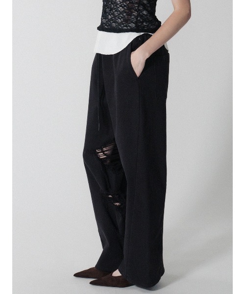 ELCHELE（エルチェレ）の「INSIDE RIPPED HOLE PANTS（スウェットパンツ・レディース・ナチュラル/ブラック・36/38）」の4枚目の写真