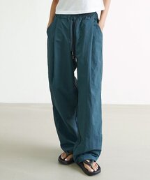 SLOW RECORD HOUSE（スローレコードハウス）の「ナイロンワンタックパンツ_ターコイズ（スウェットパンツ）」