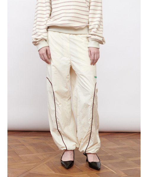Kijun(キジュン)の「Logo Woven Jogger Pants Ivory(スウェットパンツ・レディース・その他・MEDIUM)」の1枚目の写真