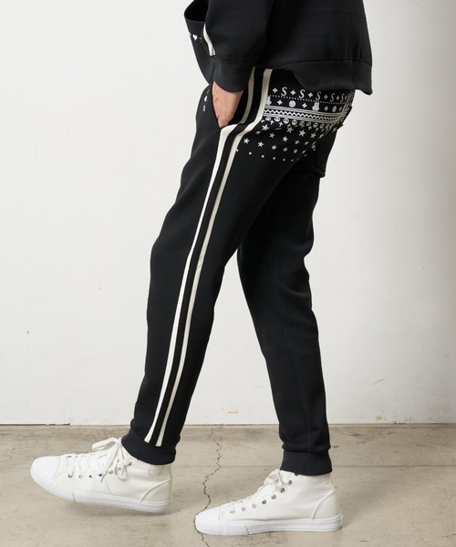 STUD MUFFIN（スタッドマフィン）の「STUD MUFFIN/スタッドマフィン/ストレッチポンチ スターノルディックフロッキー ラインリブパンツ（スウェットパンツ・メンズ・ブラック/ホワイト系2・4/3/5/2）」の2枚目の写真