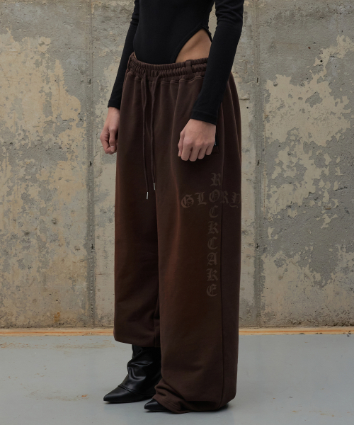 ROCKCAKE(ロックケーキ)の「Washed Cross Lettering 2way Jogger - Brown(スウェットパンツ・レディース・その他・S/XS)」の1枚目の写真